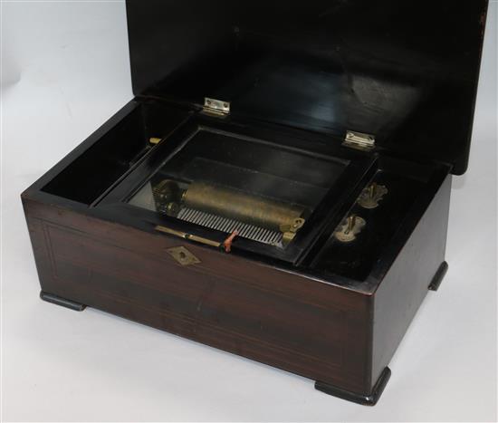 A Swiss musical box W.39cms x H.16.5cms